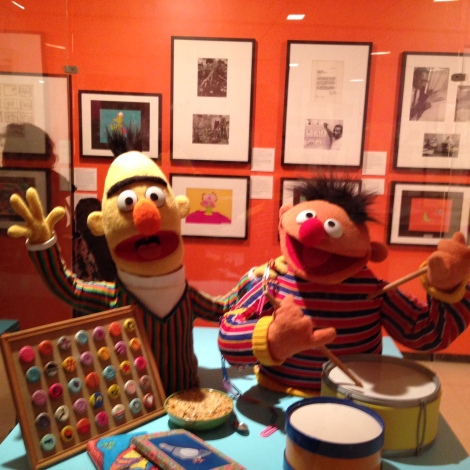 Bert & Ernie and their drums and bottlecap collection.